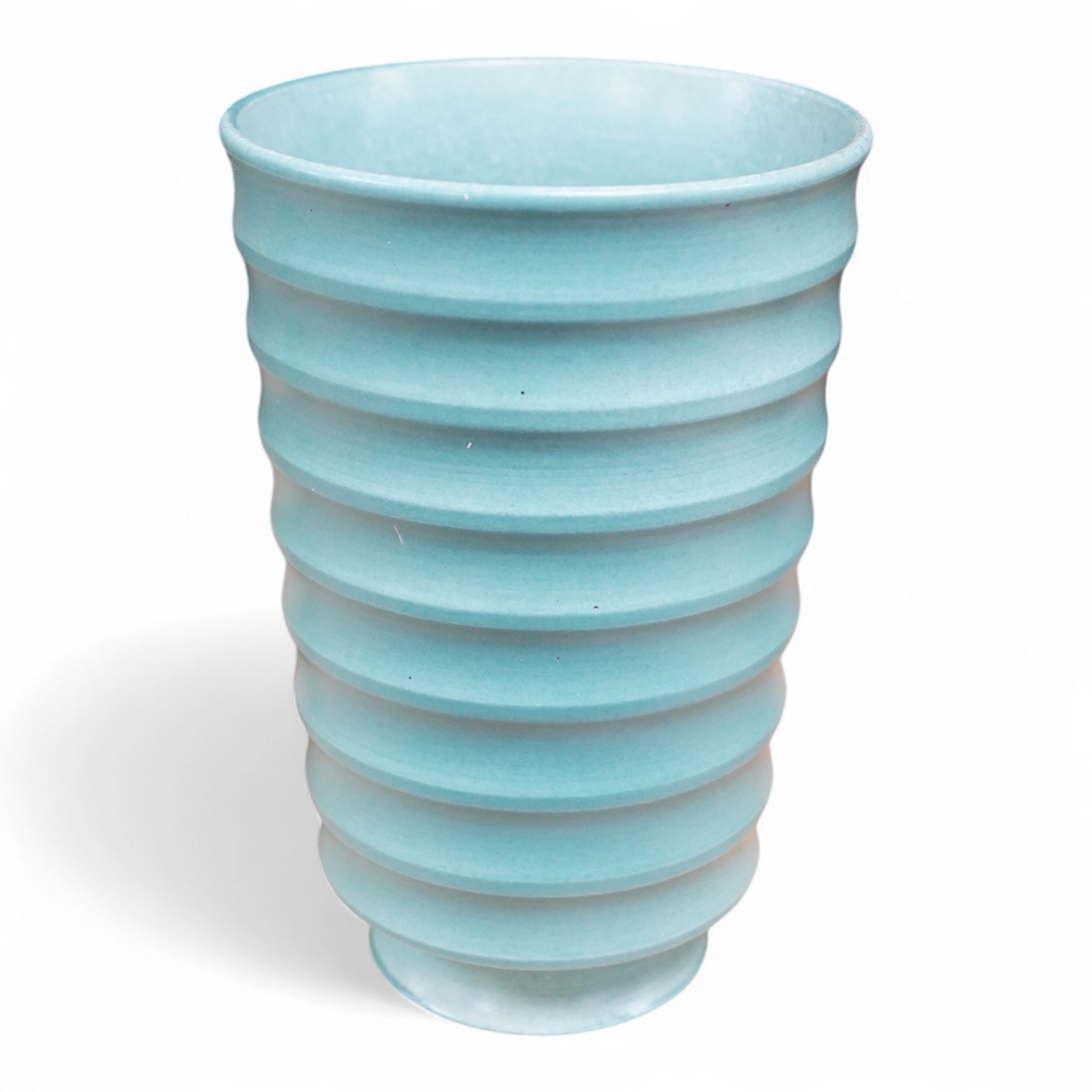 Keith Murray for Wedgwood, a ribbed tapering green glazed vase, 18cm high
